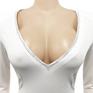 Detail of white deep V-neck dress with silver rhinestones and high-stretch fabric