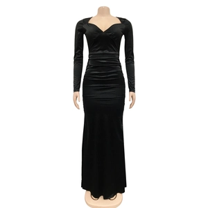 Detailed view of black ruched V-neck long sleeve evening dress with mermaid silhouette