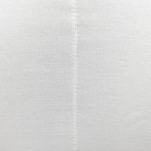 Macro close-up of white textile fabric texture with detailed vertical stitching craftsmanship