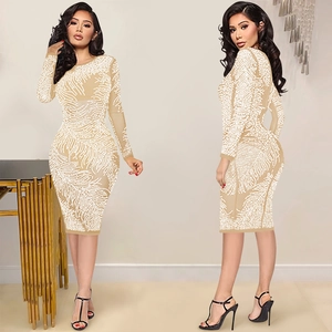 Fashionable nude long sleeve midi dress with shimmering white feather pattern and rhinestones