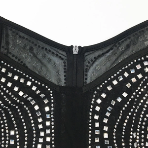 Close-up of black mesh neckline with luxury silver rhinestones and back zipper detail