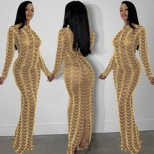Detailed front, back, and side views of a mesh maxi dress with golden wave patterns