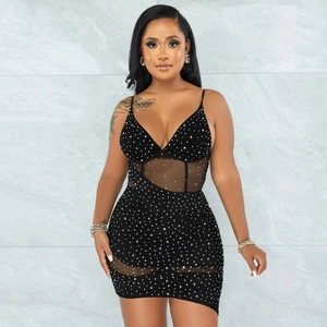 Detailed view of the sheer mesh stitching and sparkling rhinestones on the black sexy dress