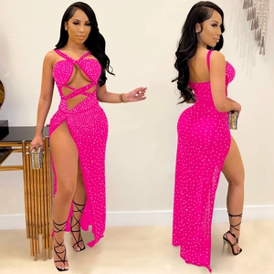 Hot pink mesh bodycon maxi dress with rhinestone embellishments and high slit detail