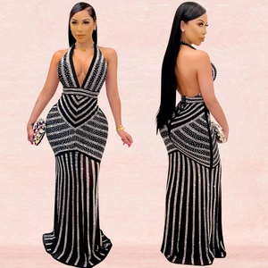 Detail view of backless V-neck evening dress with shimmering rhinestones and bodycon fit