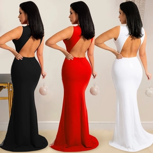 Detail view of backless mesh evening gown with rhinestones in black, red and white colors