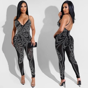 Sexy black mesh jumpsuit for women featuring silver rhinestones and deep V-neck