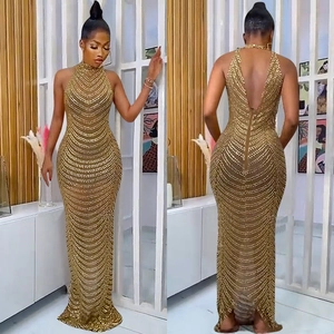 Sexy backless halter gold sequined evening gown with beaded bodycon mermaid silhouette
