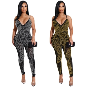 Detailed view of luxury bodycon jumpsuits with sparkling rhinestones in silver and gold