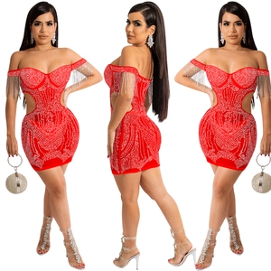 Detail view of red off-shoulder mini dress with sparkling rhinestones and long tassel fringe