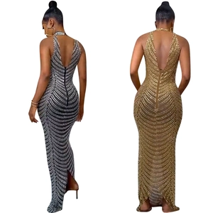 Sexy backless halter evening gown with rhinestone sequins and elegant mermaid tail hem