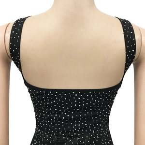 Detailed back view of black mesh maxi dress with sparkling rhinestones and open back design