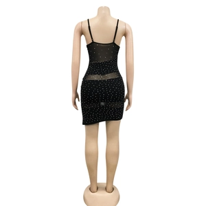 Detailed back view of sexy black bodycon dress with mesh inserts and sparkling rhinestones