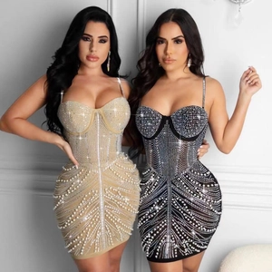 Sexy bodycon mini dress with rhinestones and pearls available in beige and black