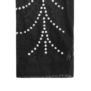 Close-up of black mesh fabric with silver rhinestone geometric pattern and fine hem details