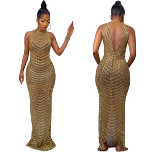 Detailed back and front view of a gold sequin backless halter neck evening maxi dress