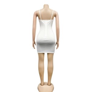 Detail view of the back of a white slim fit mini dress featuring a central zipper closure