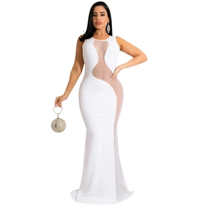Detail of white sleeveless gown with sheer mesh S-curve panel and sparkling rhinestones