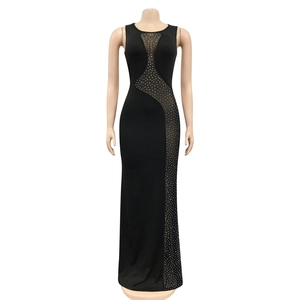 Close-up of the black evening gown featuring sheer mesh panel and sparkling rhinestones
