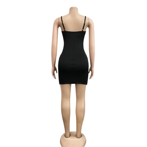 Detail view of the sleek back design and hidden zipper on a black bodycon mini dress