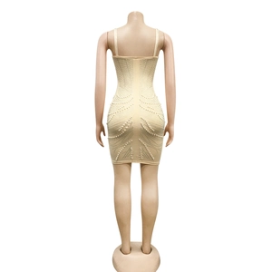 Detail of back view on bodycon mini dress with rhinestone geometric patterns