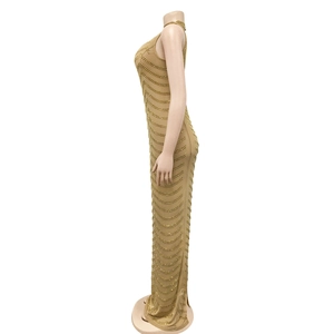 Detail showing the intricate golden sequin wave patterns on a sleeveless slim fit gown