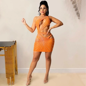 Detail of orange one-shoulder mini dress with sparkling rhinestones and sexy cut-outs