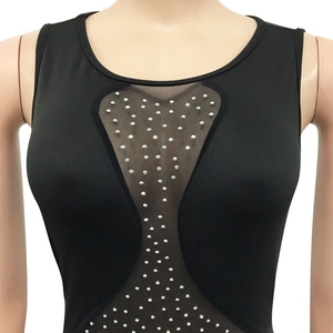 Close-up of sheer mesh panel and sparkling rhinestones on black sleeveless dress