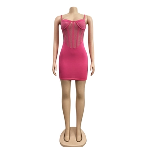 Hot pink corset mini dress with rhinestones and mesh detailing shown on mannequin