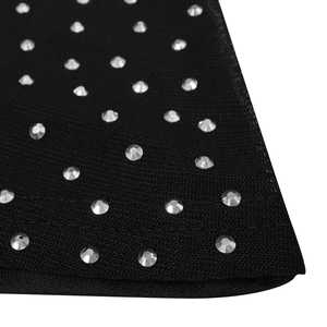 Close-up of black mesh fabric with sparkling rhinestones and neat hem stitching detail
