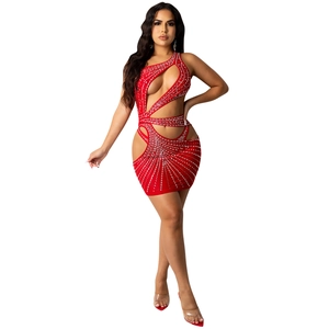 Detail of red hollow-out mini dress with rhinestone patterns and single shoulder cutout
