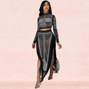 Two-piece black mesh set with rhinestone lines and long fringe skirt for party wear