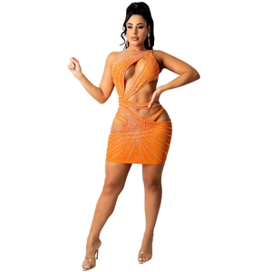 Detail of orange one-shoulder cutout dress with sparkling rhinestones and mesh fabric