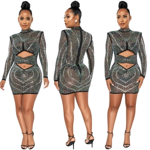 Detailed close-up showing rhinestone patterns and side cut-outs on the mesh mini dress