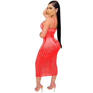 Close-up of red bodycon midi dress with vertical rhinestone patterns and spaghetti straps