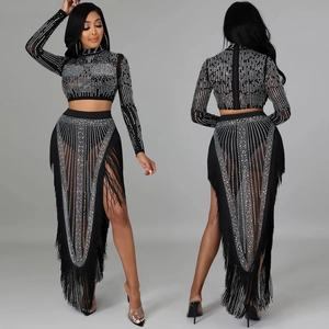 Detailed view of the sparkling rhinestones and mesh texture on the black two-piece set