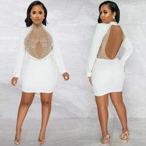 Elegant white mesh mini dress with sequins, pearls and open back for evening parties