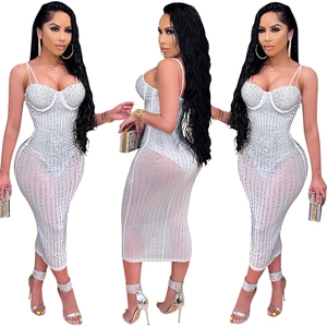 Detailed views of white mesh corset dress with sparkling rhinestones and sheer fabric