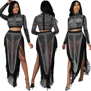 Detailed views showing sparkling rhinestones and long fringe on black mesh two-piece set