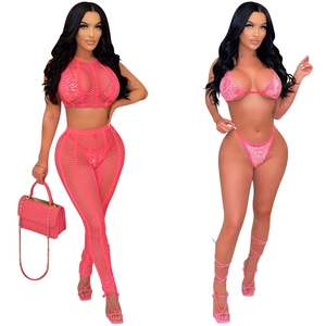 Detail view of pink mesh pants set featuring rhinestone accents and mesh long sleeves