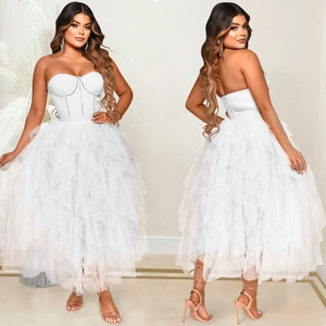 Elegant white strapless corset dress with layered tulle skirt and sparkling sequin trim