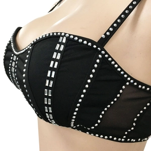 Detail of black rhinestone camisole with mesh panels and sparkly crystal embellishments