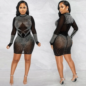 Sexy black mesh rhinestone mini dress with long sleeves and shimmering diamond patterns