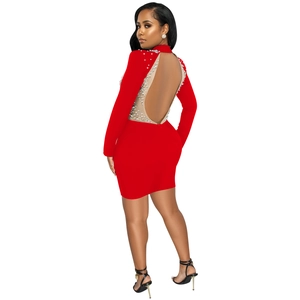 Detailed back view of sexy red bodycon dress with sheer mesh and white pearls
