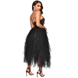 Detail of layered black tulle ruffles and rhinestone edging on the strapless dress