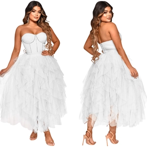 Detailed corset view of white strapless tulle dress with rhinestones and layered mesh