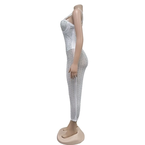 Detailed side view of white mesh rhinestone evening dress with sparkling vertical patterns