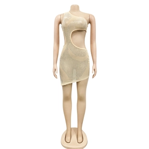 Detail view of champagne mesh dress featuring hollow-out waist and sparkling rhinestones