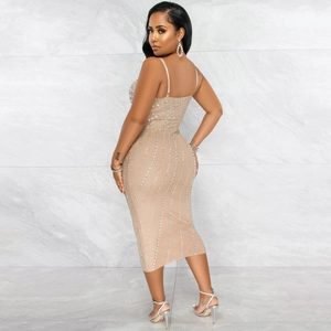 Detail of slim fit midi dress with shimmering silver rhinestones and thin shoulder straps