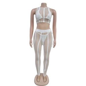 Close-up of white mesh rhinestone two-piece set featuring sheer fabric and high-waist fit
